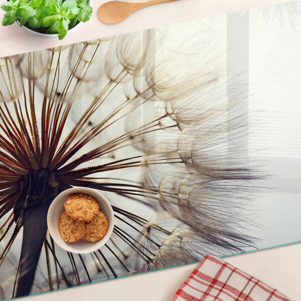 Tabla de cortar de cristal Dientes de león a la luz