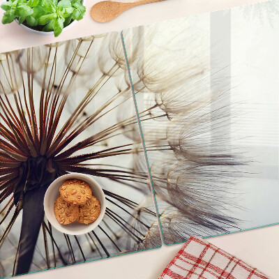 Tabla de cortar de cristal Dientes de león a la luz