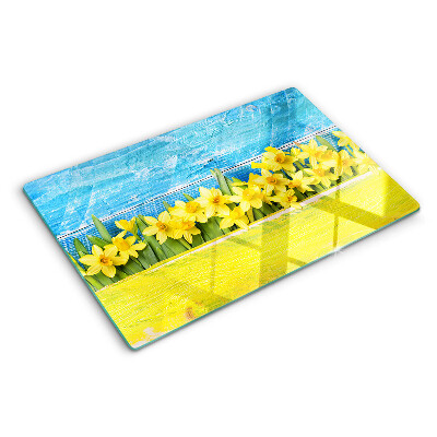 Tabla de cocina Flores de narciso contra el cielo