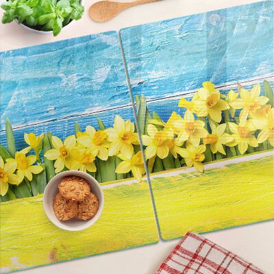 Tabla de cocina Flores de narciso contra el cielo