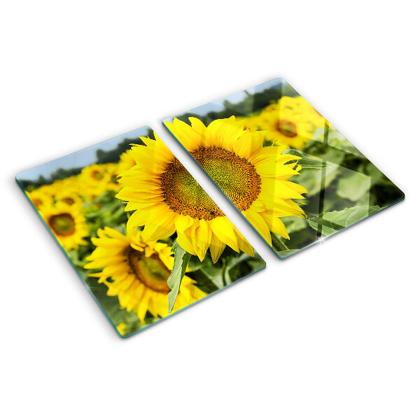 Tabla para cortar Girasoles sobre un fondo verde.