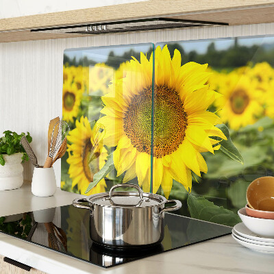 Tabla para cortar Girasoles sobre un fondo verde.