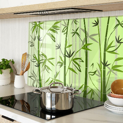 Tabla de cortar de cristal Bambú sobre un fondo verde