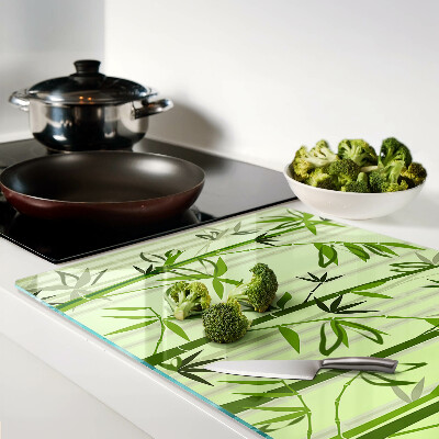 Szklana deska do krojenia Bamboo on green background