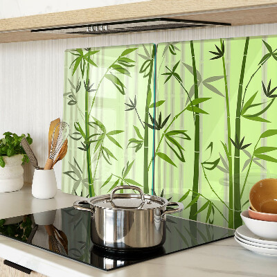 Tabla de cortar de cristal Bambú sobre un fondo verde