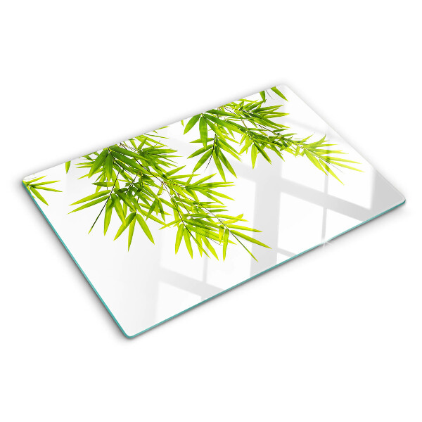 Szklana deska kuchenna Liście bambusa na tle okna