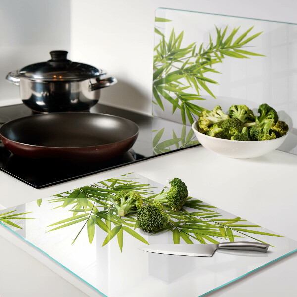 Szklana deska kuchenna Liście bambusa na tle okna