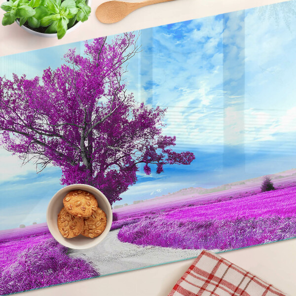 Tabla de cocina Un árbol morado contra el cielo.