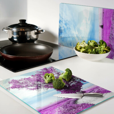 Tabla de cocina Un árbol morado contra el cielo.