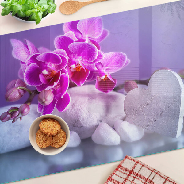 Tabla para cortar Orquídeas sobre piedras