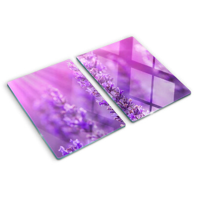 Tabla de cortar de cristal Flores de lavanda sobre un fondo morado.