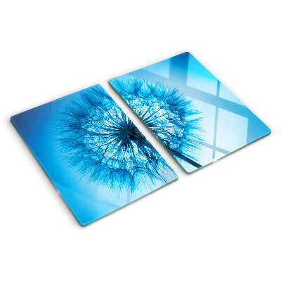 Tabla de cortar de cristal Diente de león sobre fondo azul