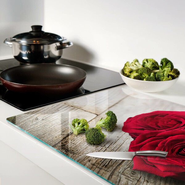 Tabla de cocina Rosas rojas sobre un fondo de madera