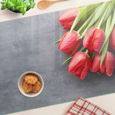 Tabla para cortar Tulipanes sobre un fondo gris