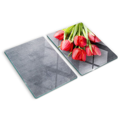 Tabla para cortar Tulipanes sobre un fondo gris