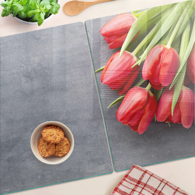 Tabla para cortar Tulipanes sobre un fondo gris