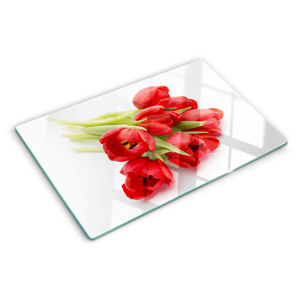 Tabla de cortar de cristal Tulipanes rojos sobre fondo blanco