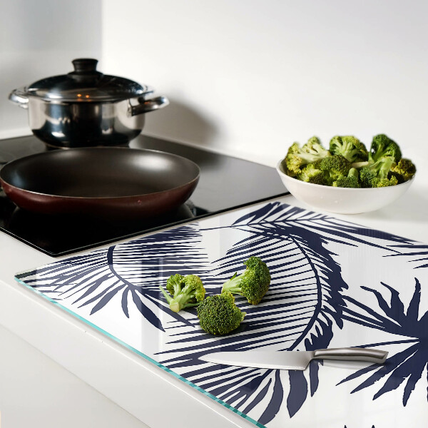 Tabla de cortar de cristal Hojas de palma sobre fondo blanco