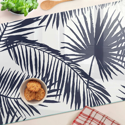 Tabla de cortar de cristal Hojas de palma sobre fondo blanco