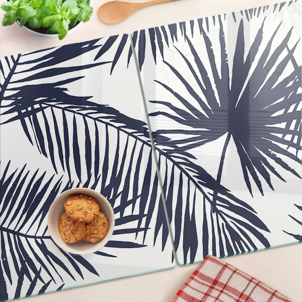 Tabla de cortar de cristal Hojas de palma sobre fondo blanco