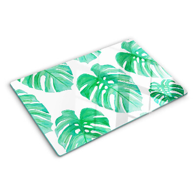 Tabla de cortar Hojas de monstera sobre fondo blanco