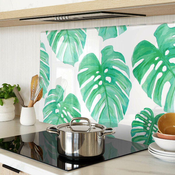 Tabla de cortar Hojas de monstera sobre fondo blanco