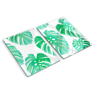 Tabla de cortar Hojas de monstera sobre fondo blanco