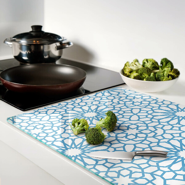 Tabla de cortar de cristal Motivo floral en tonos azules.