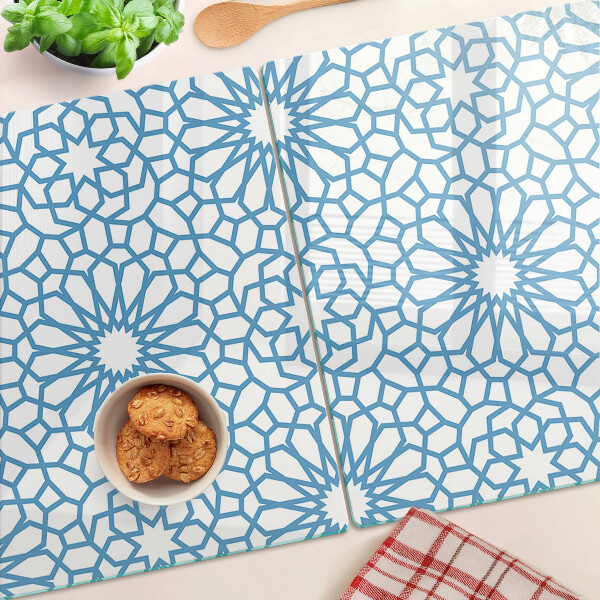 Tabla de cortar de cristal Motivo floral en tonos azules.