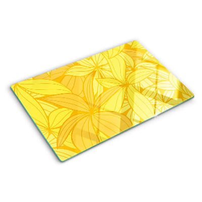 Tabla de cocina Hojas amarillas en estilo tropical.