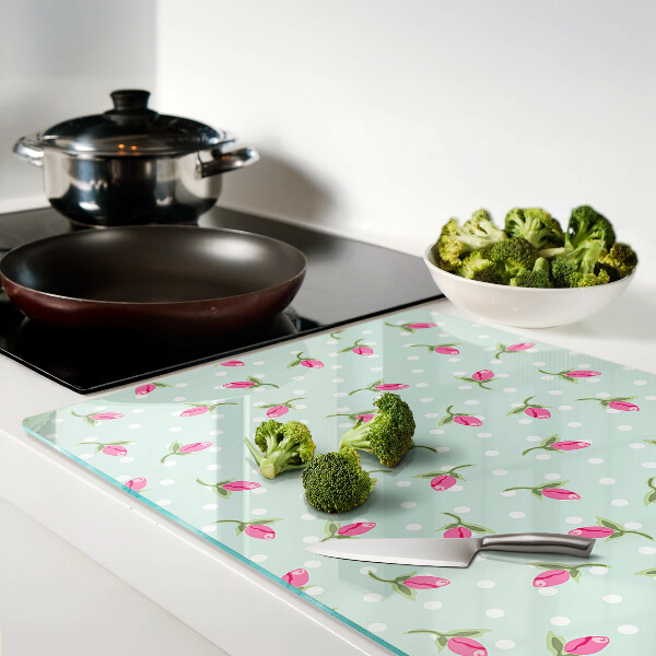 Tabla para cortar Tulipanes rosas sobre fondo verde