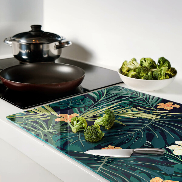 Tabla de cortar de cristal Patrón tropical con hojas y flores.