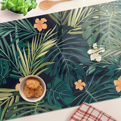 Tabla de cortar de cristal Patrón tropical con hojas y flores.