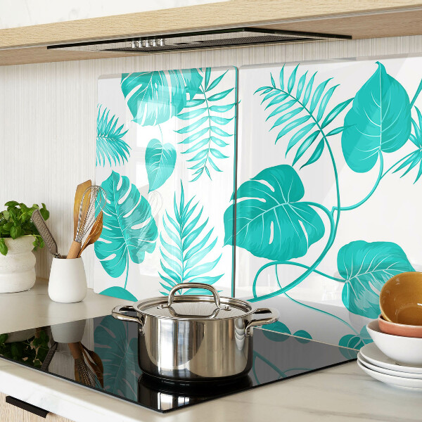 Tabla para cortar Hojas tropicales en tonos verdes.