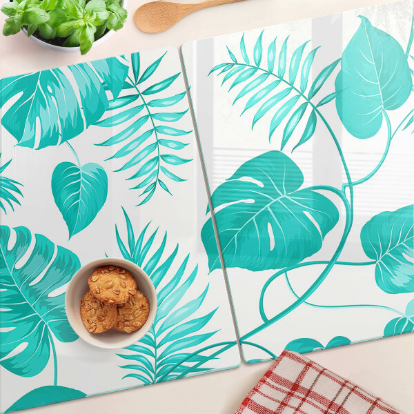 Tabla para cortar Hojas tropicales en tonos verdes.