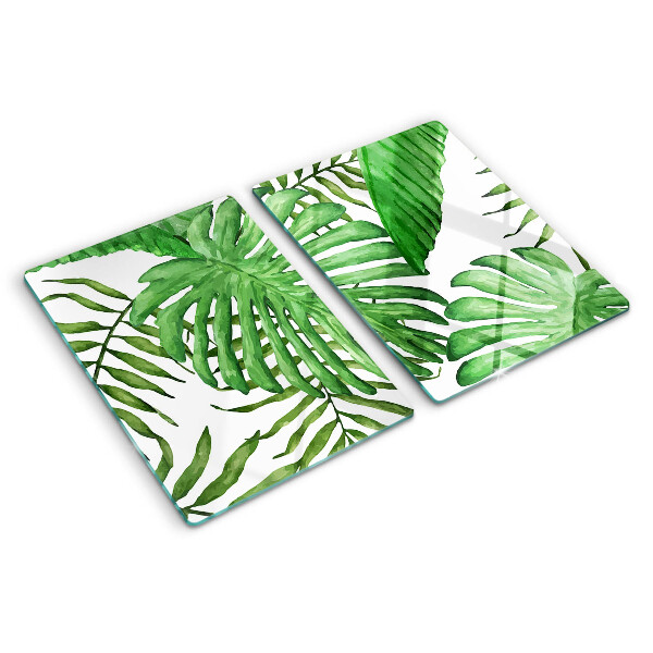 Tabla de cortar de cristal Hojas tropicales en tonos verdes.