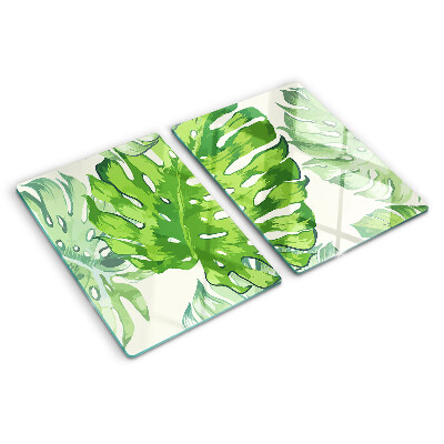 Tabla de cocina Hojas de monstera sobre un fondo claro