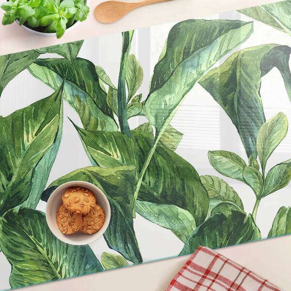 Tabla de cortar de cristal Hojas de plantas tropicales