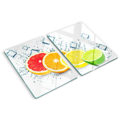 Tabla de cortar de cristal Frutas cítricas en rodajas de colores