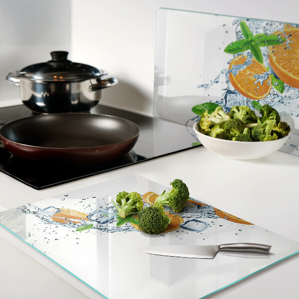 Tabla para cortar Frutas cítricas en agua