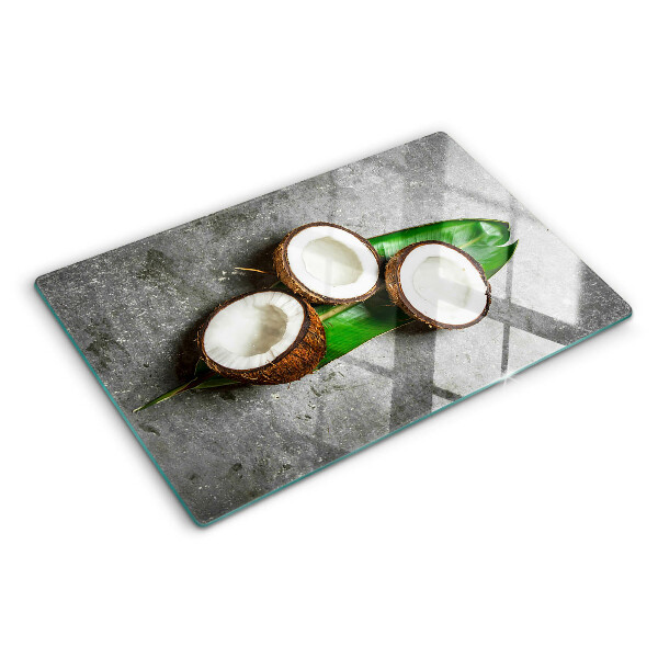 Tabla de cortar de cristal Coco sobre un fondo de hormigón