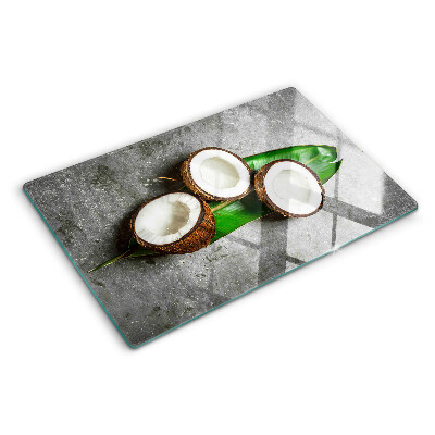 Tabla de cortar de cristal Coco sobre un fondo de hormigón