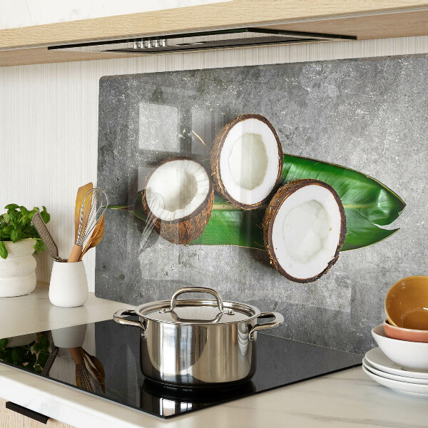 Tabla de cortar de cristal Coco sobre un fondo de hormigón