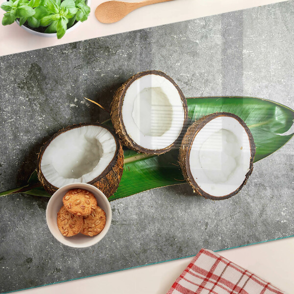 Tabla de cortar de cristal Coco sobre un fondo de hormigón