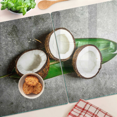 Tabla de cortar de cristal Coco sobre un fondo de hormigón