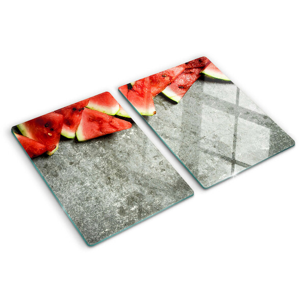 Tabla de cocina Rebanadas de sandía sobre un fondo gris