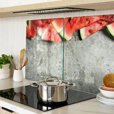 Tabla de cocina Rebanadas de sandía sobre un fondo gris