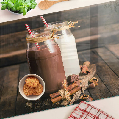 Tabla de cocina Frascos de bebidas sobre un fondo de madera
