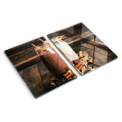 Tabla de cocina Frascos de bebidas sobre un fondo de madera