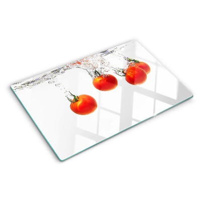 Tabla de cortar de cristal Tomates en agua